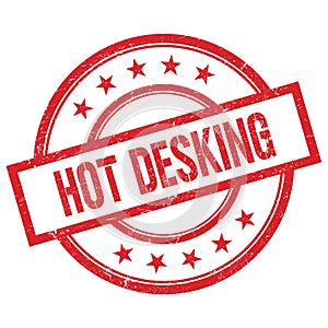 HOT DESKING text written on red vintage round stamp