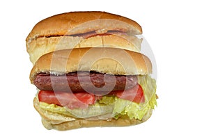 hot dog in buns with thousand island dressing sauce of ketchup mayonnaise, grilled beef sausage, tomato, lettuce