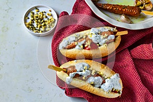 Hot dog with carrots on white plate. vegetarian fast food