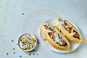 Hot dog with carrots on white plate. vegetarian fast food. Copy space