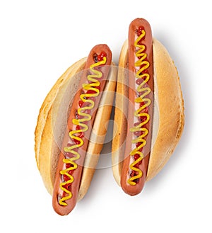 Hot dog with ketchup and mustard on white