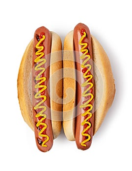 Hot dog with ketchup and mustard on white