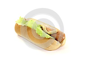Hot dog with lettuce leaf