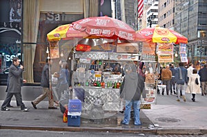 A hot dog stand vendor