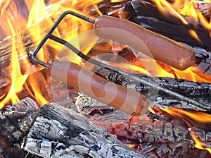 Hot dogs being roasted