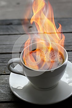 Hot drink. Coffee burning in fire