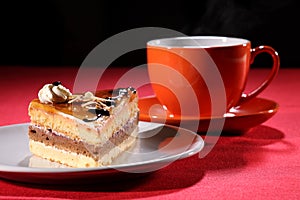 Hot drink and coffee cake with whipped cream