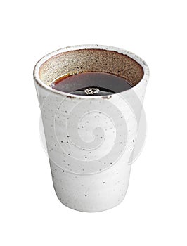 Hot espresso in ceramic cup on white background
