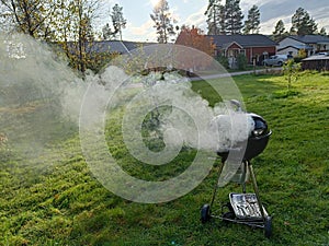 Hot fire burning in a kettle grill barbecue