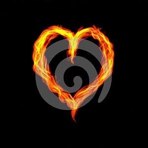 Hot fire heart burning on black background. Passion and desire