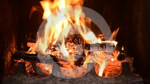 Hot fireplace full of burning wood