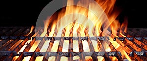 Hot Flaming BBQ Grill With Bright Flames And Glowing Coals