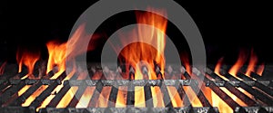 Hot Flaming BBQ Grill With Bright Flames And Glowing Coals