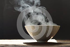 Steaming of hot food soup in a bowl.