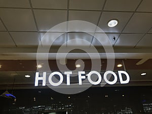 Hot food name board fixed for an newly opened business of selling cooked food items in the event of functions upon orders for