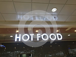 Hot food name board fixed for an newly opened business of selling cooked food items in the event of functions upon orders for