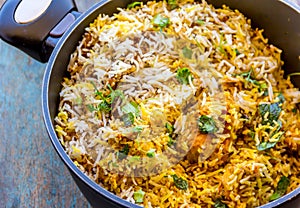 Hot and Fresh Chicken Biryani in a Pan Close Up Image