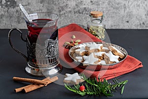 Hot fruit tea with traditional Christmas cookies