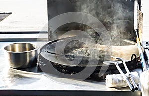 Hot frying pan prepare street food photo
