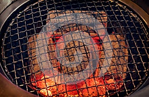 Hot Glowing Coal Burning in a Barbeque Grill.