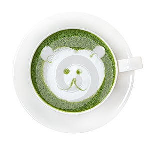 Hot green tea matcha latte cup with cute polar bear face milk foam latte art on top isolated on white background, clipping path i