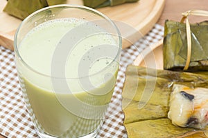 Hot green tea soybean milk on glass