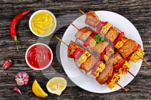 Hot Grilled pork meat with corn cob slices