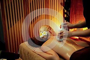 Hot herbal ball spa massage body treatment. Quiescent photo