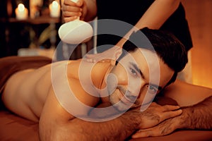 Hot herbal ball spa massage body treatment. Quiescent photo