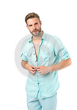 It is hot here. Man handsome bearded guy undressing white background isolated. Guy confident attractive macho feels