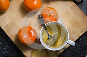 Hot infusion with tangerines and butter cookies