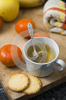 Hot infusion with tangerines and butter cookies. Detailed