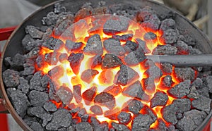 Hot ingot iron working in the workshop of blacksmith