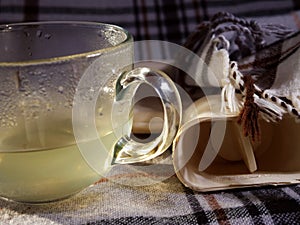 Hot lemon drink and hot water bottle for cold and flu relief