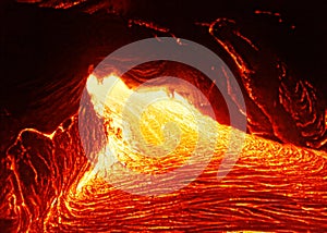 Hot magma emerges from a crack in the earth