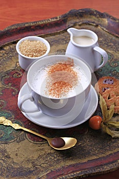 Hot milk with nutmeg photo