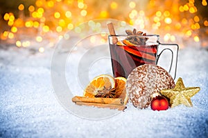 Hot mulled spiced red wine in glass mug