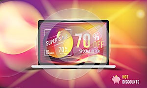 Hot offer is a super discount of 70 . Concept of advertising with a laptop and banner with hot discounts and realistic fire with l