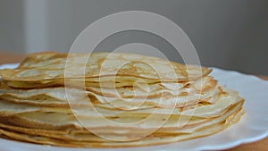 Hot pancakes on a plate horisontal