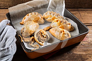 Hot pasties from butter enriched puff pastry filled with minced