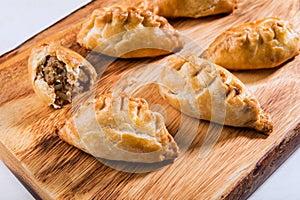 Hot pasties from butter enriched puff pastry filled with minced