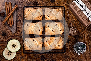 Hot pastry, apple strudel on a lattice, New Year and Christmas, traditions and gifts, rustic style