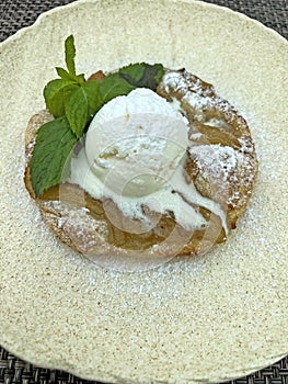 Hot pear pie with vanilla ice cream