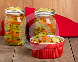 Hot pepper slices canned in mason jars