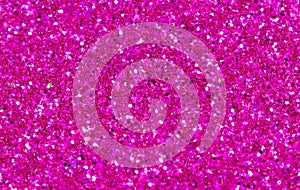 Hot pink abstract background. Pink glitter closeup photo. Pink shimmer wrapping paper.