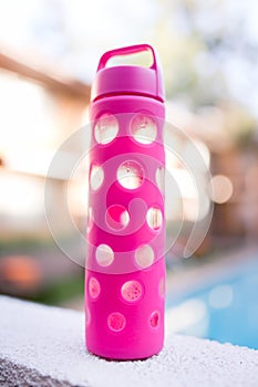Hot pink glass water bottle