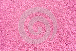 Hot pink glitter twinkle abstract New Year or Christmas holiday background with sparkles. Modern luxury mock up with sequins.