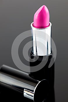 Hot pink lipstick.