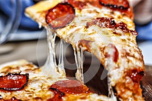 Hot pizza slice, melting cheese, pizza piece, pepperoni pizza, I