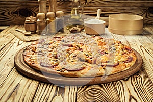 Hot pizza slice with melting cheese on a rustic wooden table.pepperoni pizza,Hot Homemade Pepperoni Pizza Ready to Eat,Supreme Pi